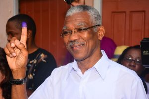 Presidential Candidate of the A Partnership for National Unity and Alliance For Change (APNU+AFC) David Granger displays his inked finger after voting at ... Photo /Guardian