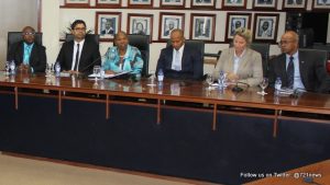  On the left are representatives from the SER, and on the right members of the Council of Ministers, in the Dr. A. C. Wathey Legislative Hall at the Government Administration Building. (DCOMM) 