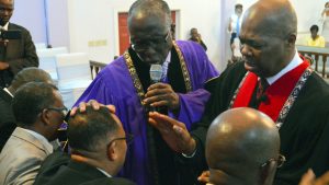 Chief Consecrator Bishop Clayton Martin (left) and Regional Overseer Bishop Michael Greenaway anoint Bishop Alfred Lafaille during the Ordination service on Saturday, July 18, 2015 (COGOP Leeward Photo)