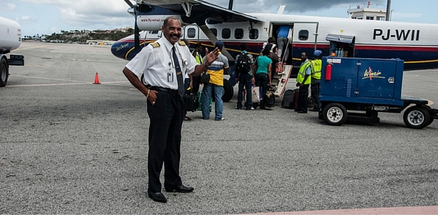  Captain R. Hodge in front of our DHC 600 Twin otter departing PJIA, St. Maarten