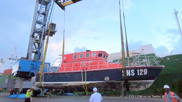 Sea Rescue Boat SNS129 being prepared to be loaded on Cargo Vessel-001